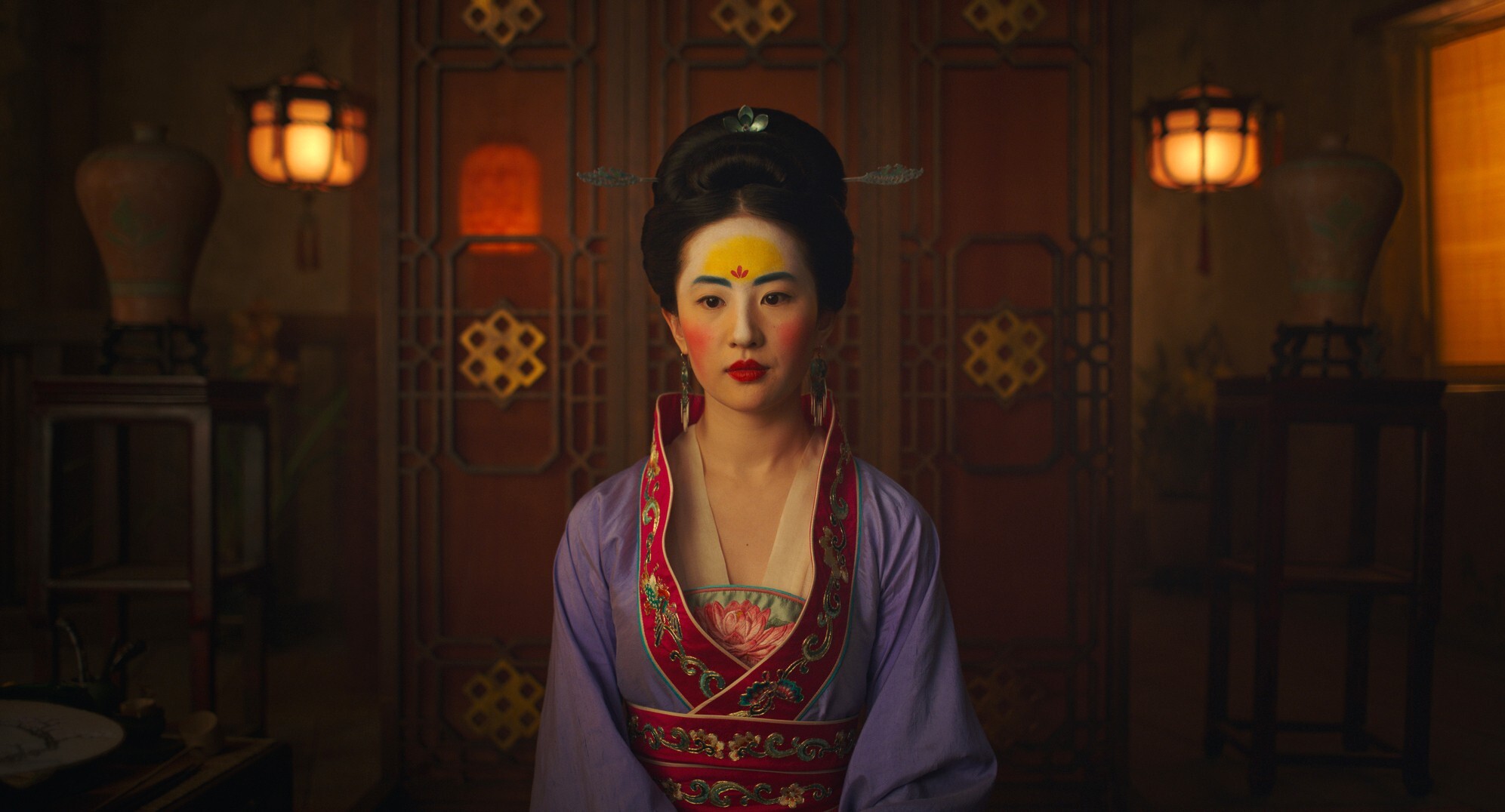 This image released by Disney shows Yifei Liu in the title role of "Mulan." (Disney via AP)