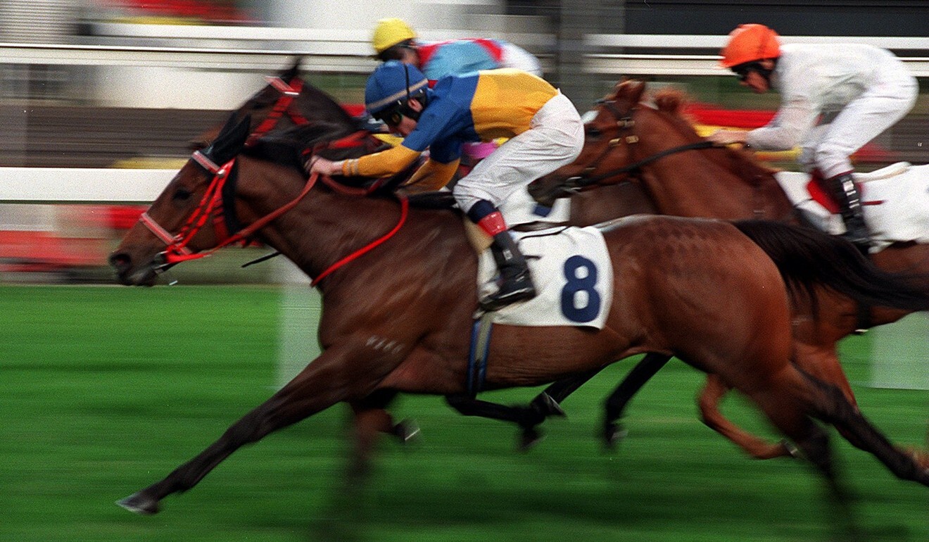 Irish jockey Pat Smullen brings Taurus home at Sha Tin in January 2000.