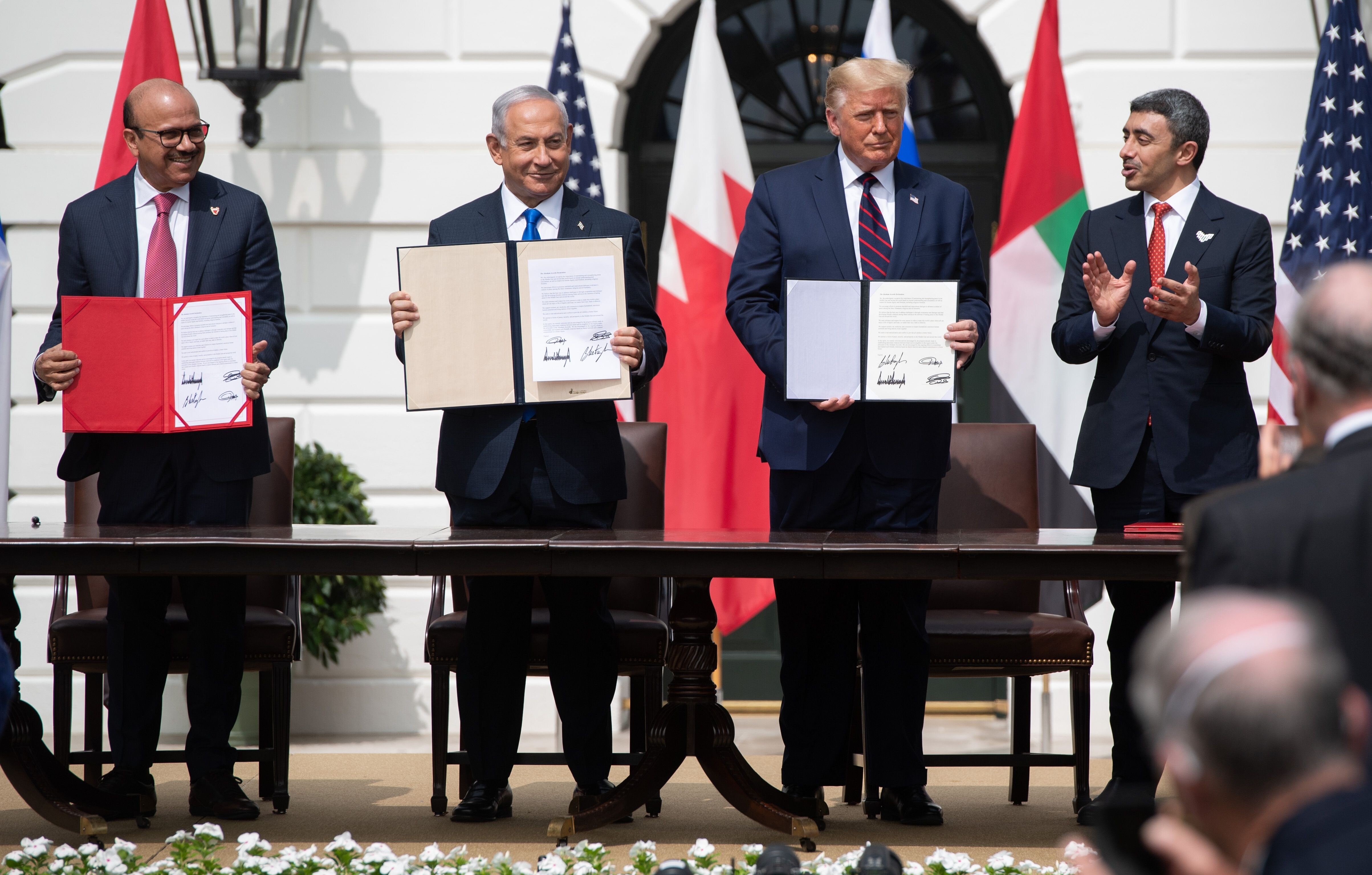 (From left) Bahrain Foreign Minister Abdullatif al-Zayani, Israeli Prime Minister Benjamin Netanyahu, US President Donald Trump and UAE Foreign Minister Abdullah bin Zayed Al-Nahyan take part in the signing of the Abraham Accords in Washington on Tuesday. Photo: AFP