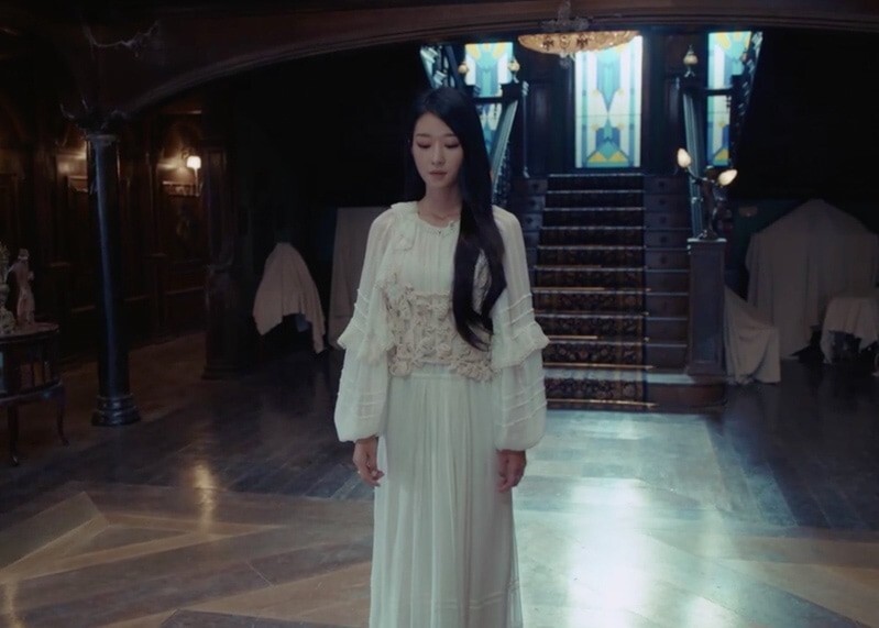 Seo Ye-ji's wardrobe in the Netflix show It’s Okay to Not Be Okay is full of delicious pieces by Korean labels – the K-drama star is pictured here in a white gown worn with a crochet bustier by luxe Korean fashion brand Eenk. Photo: TVN