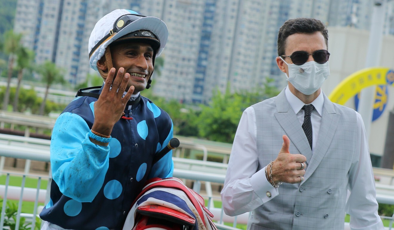 Karis Teetan celebrates his four-timer at Sha Tin on Sunday with Douglas Whyte.