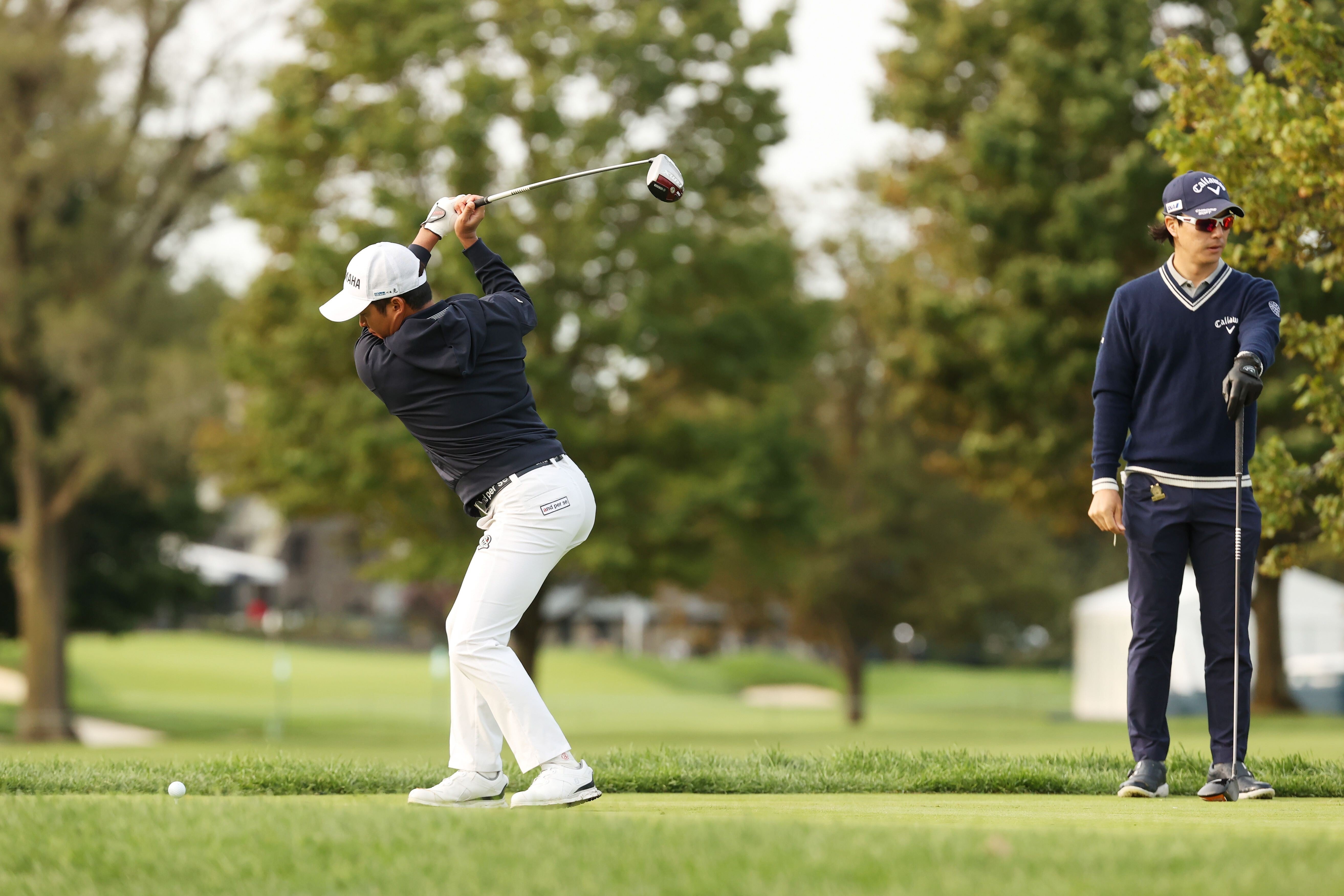 Shugo Imahira of Japan tees off on a benign day at Winged Foot in the 120th US Open. Photo: AFP