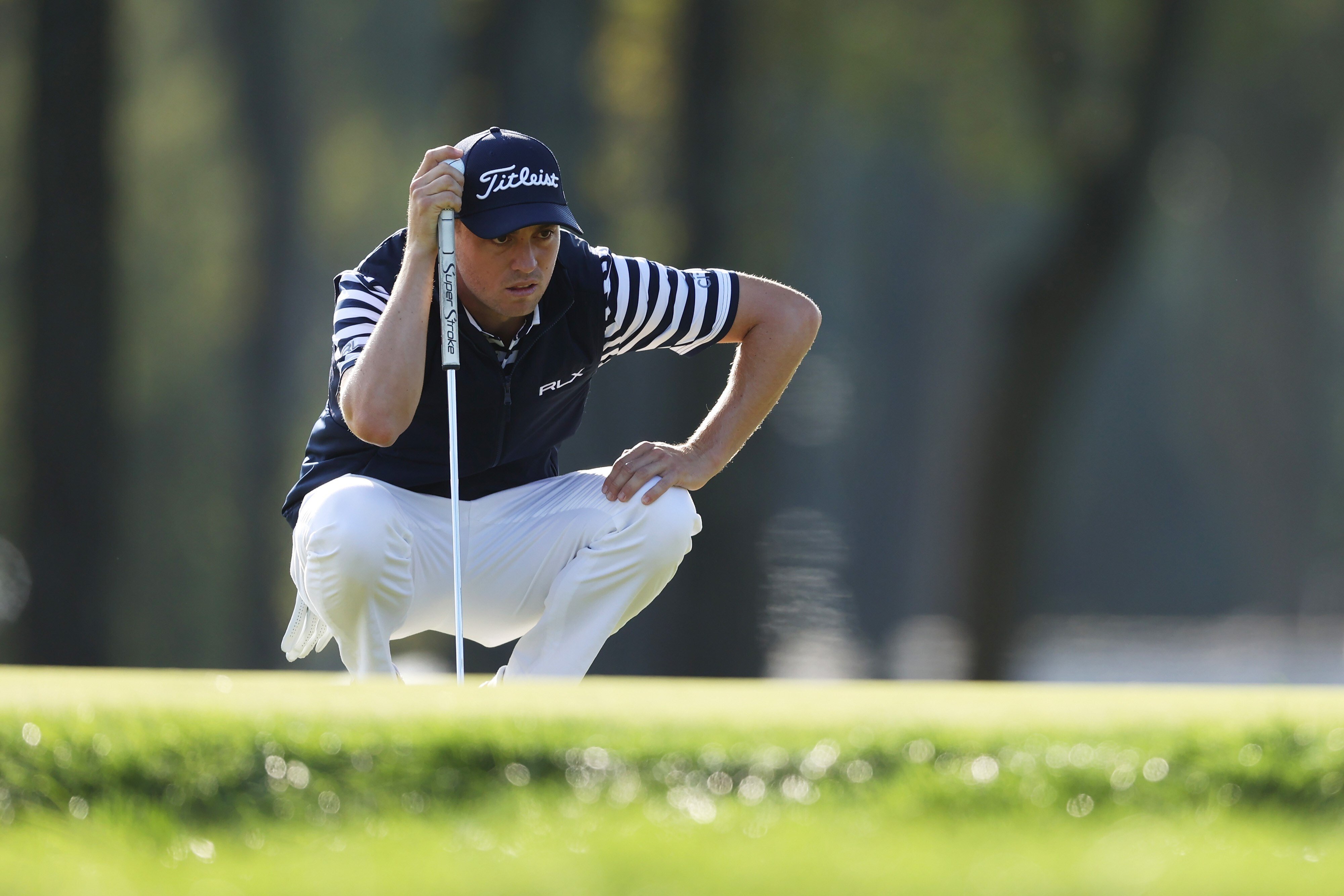 Justin Thomas lines up a putt on the second hole during the second round of the 120th US Open at Winged Foot Golf Club in Mamaroneck, New York. Photo: AFP