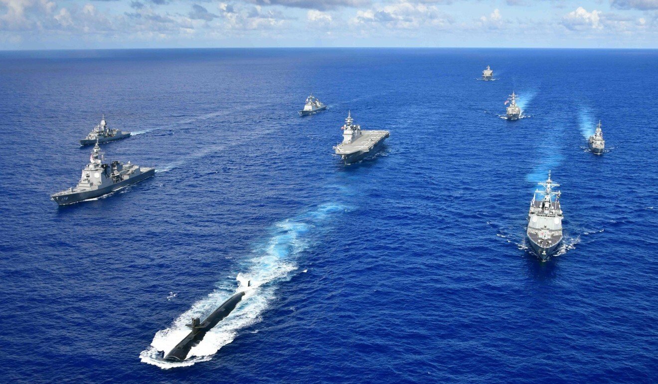 US, Australian and Japanese ships on a joint training exercise. Photo: Handout