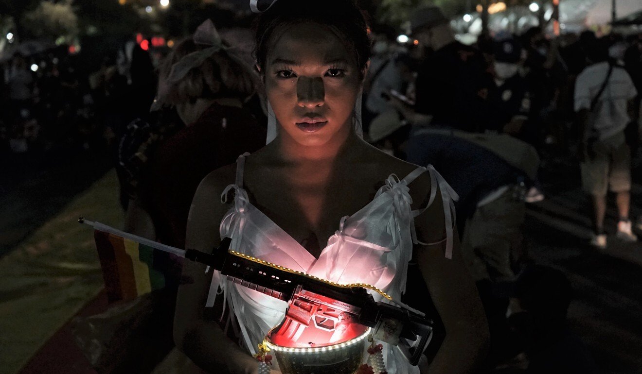 Angele Anang wore a dress with white ribbons – one of the symbols of the democracy movement – on Saturday. Photo: Handout