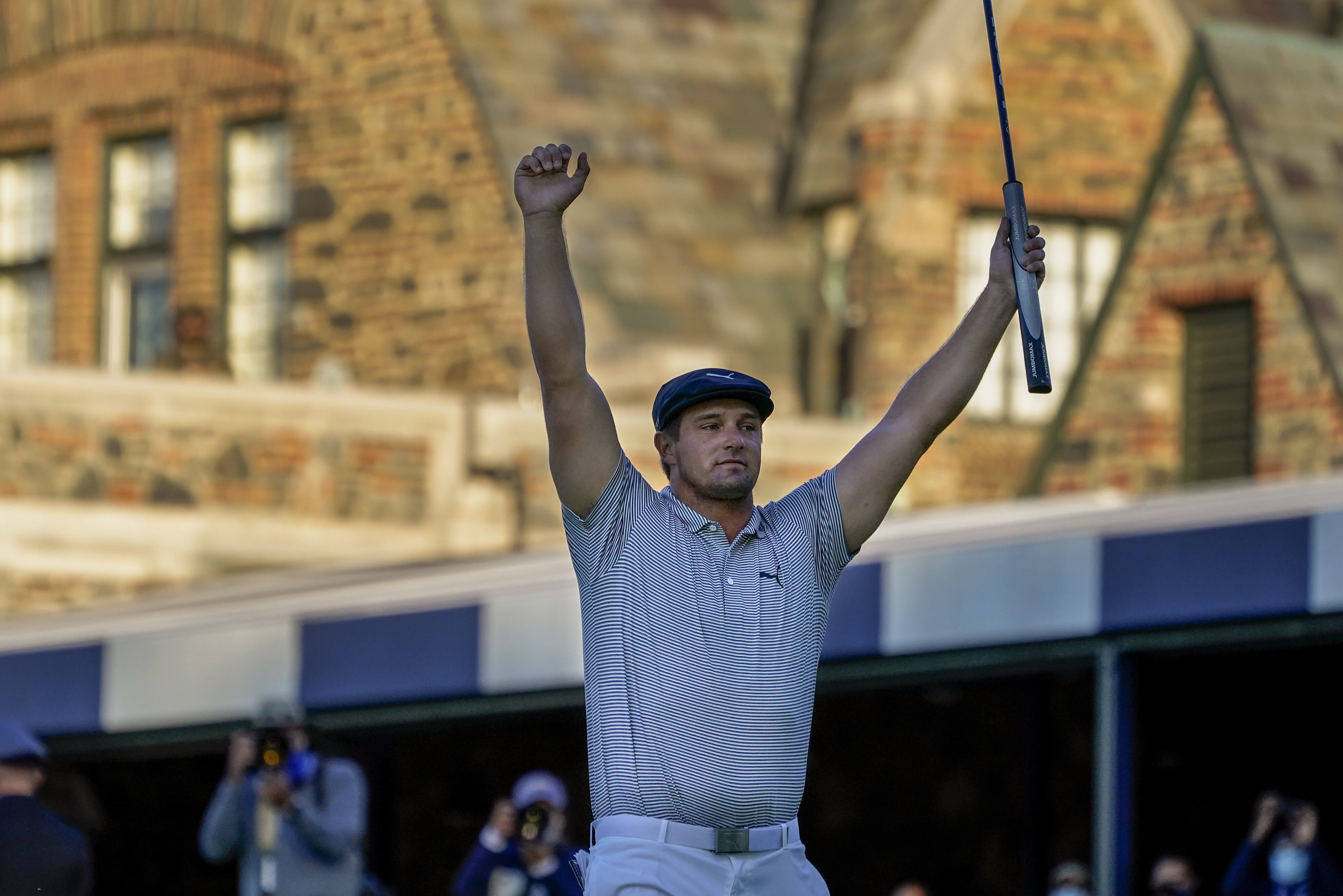 American Bryson DeChambeau raises his arms in victory after winning the US Open in Mamaroneck, New York. Photo: AP