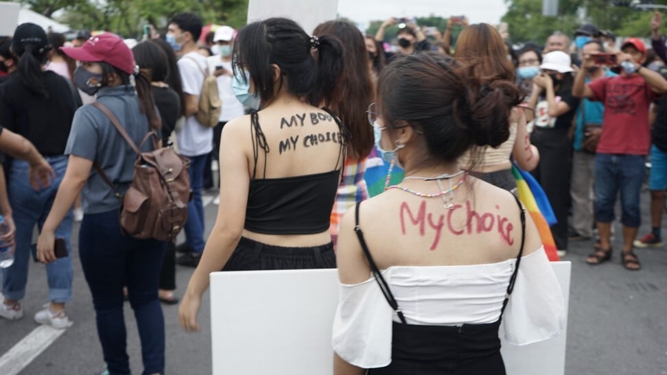 Women painted with slogans including “my body, my choice” at a rally in Bangkok on September 19, 2020. Photo: Handout