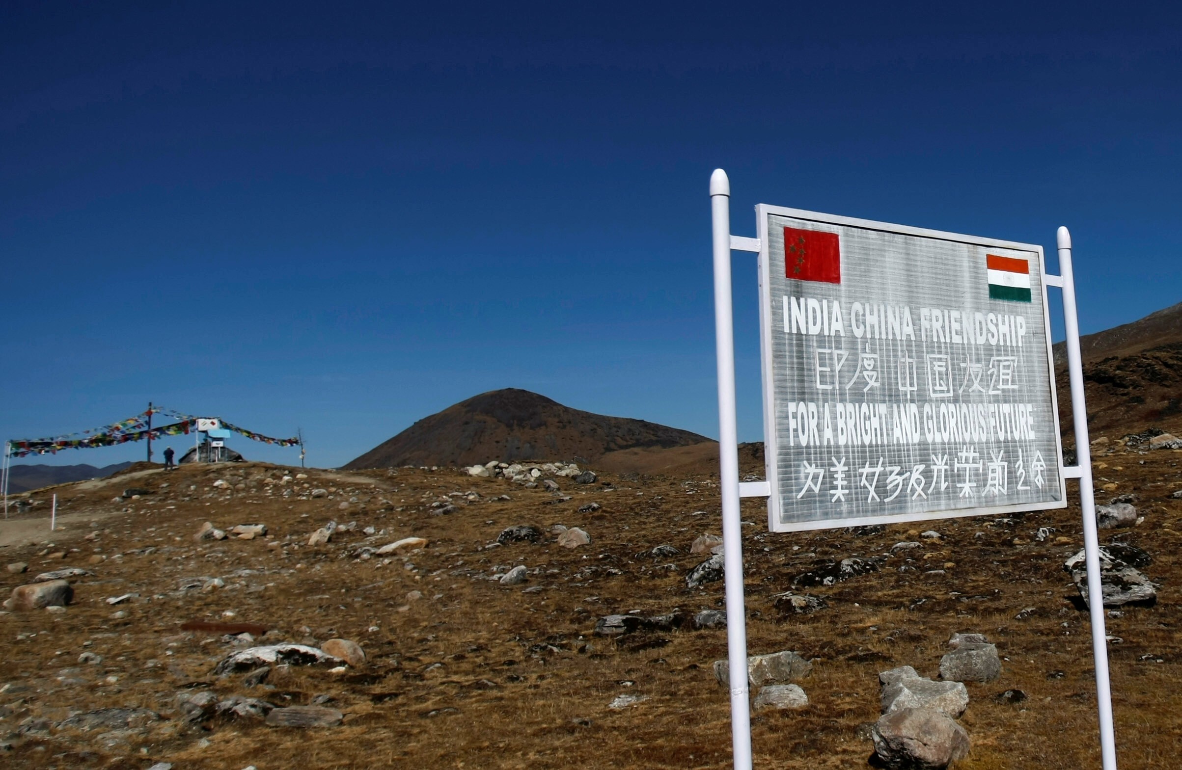 A signboard seen from the Indian side of the India-China border at Bumla in the northeastern Indian state of Arunachal Pradesh on November 11, 2009. The once-cordial relations between India and China appear set to deteriorate further with India’s use of the Tibet card and China’s steadfast refusal to see India as an equal. Photo: Reuters