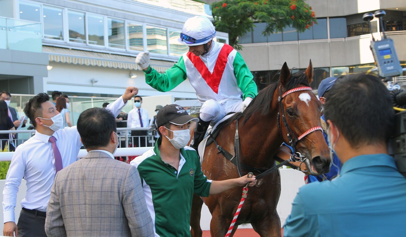 Joao Moreira celebrates Good Luck Friend’s win with his owners at Sha Tin.