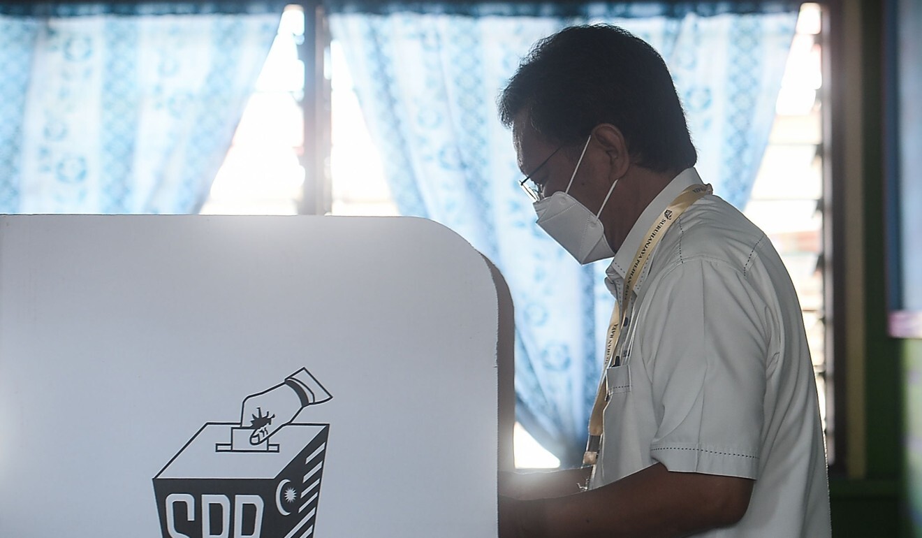 Warisan President Shafie Apdal casts his vote during the state elections on Saturday. Photo: AFP