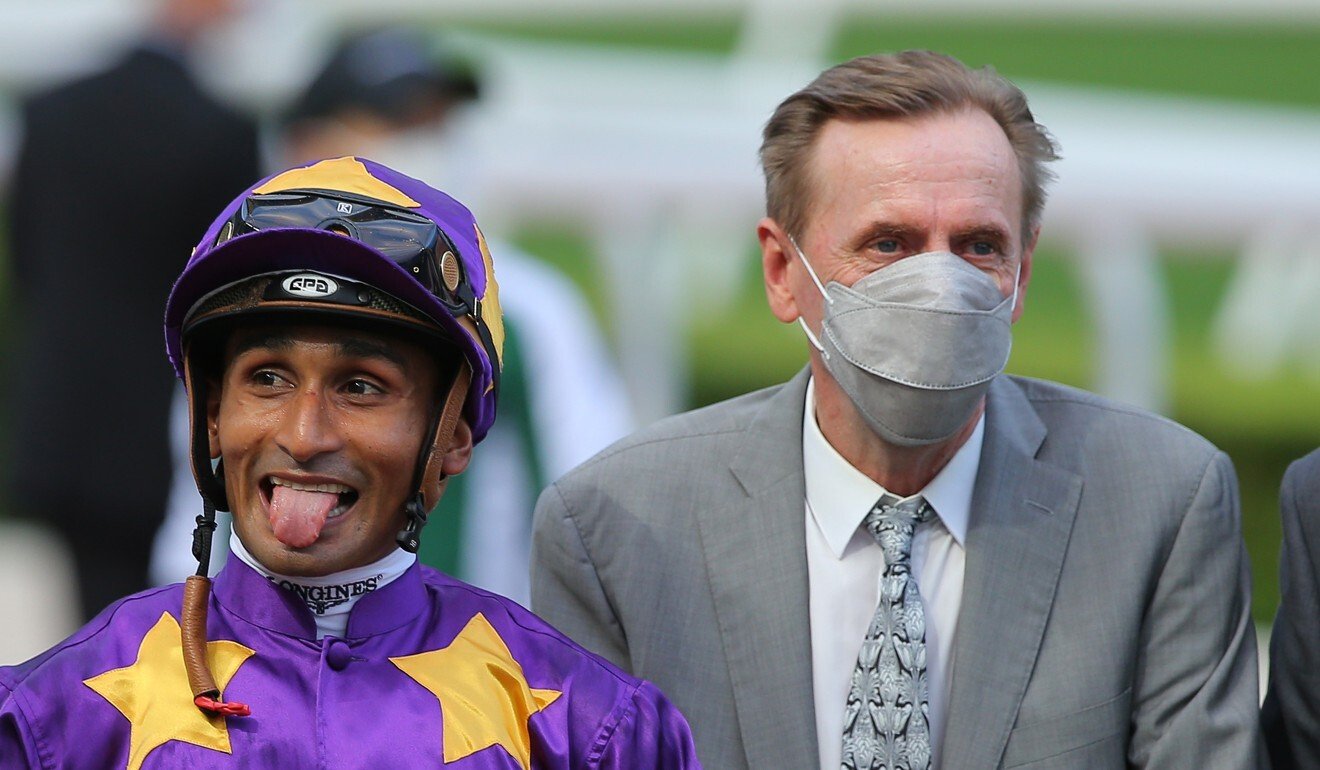 Jockey Karis Teetan and trainer John Size celebrate the win of Lucky Express.