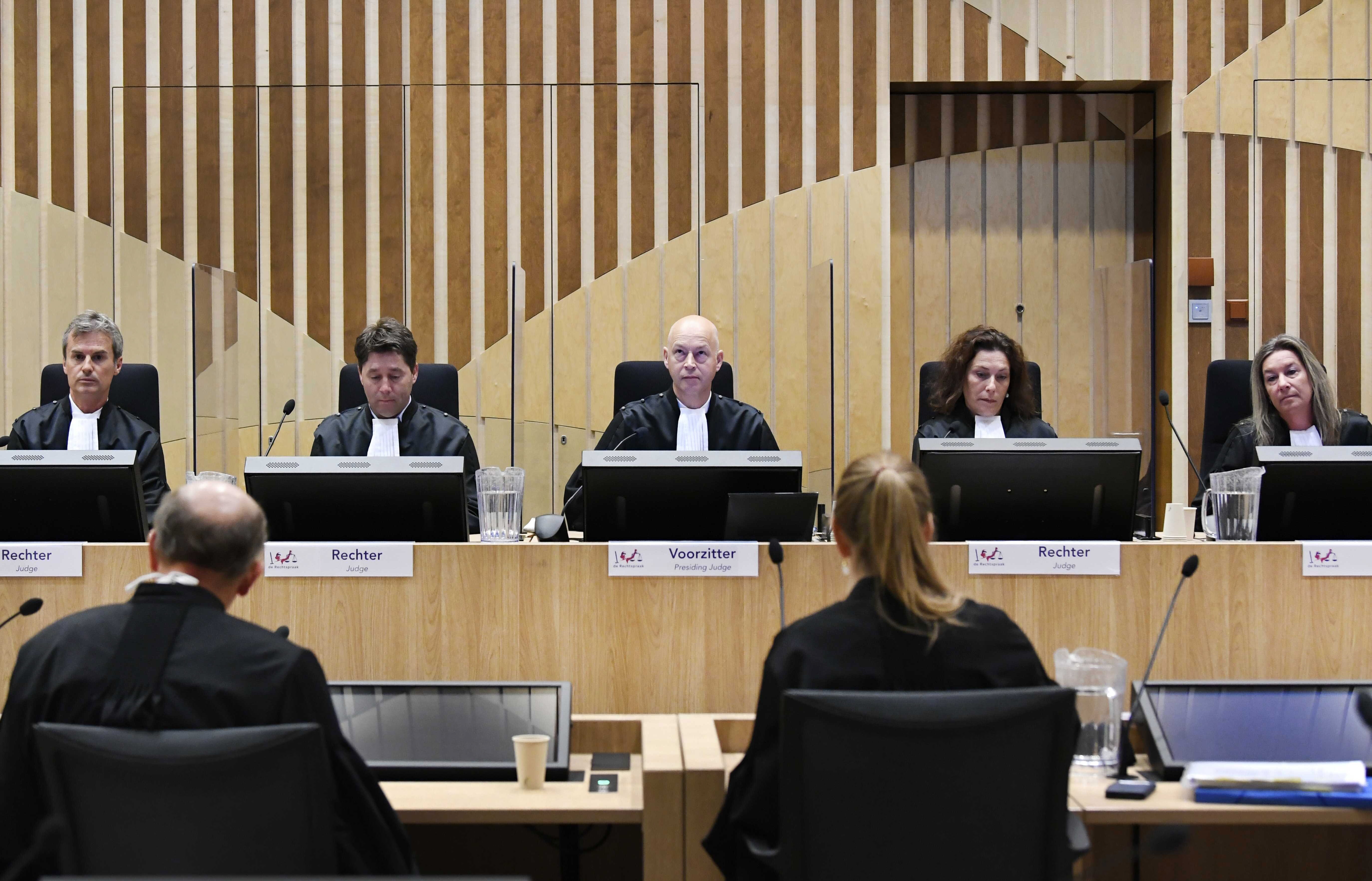 Judge Hendrik Steenhuis (centre) attends the hearing in the trial of suspects charged with shooting down Malaysia Airlines Flight 17, in the high-security courtroom of the Schiphol Judicial Complex in The Netherlands. Photo: EPA-EFE