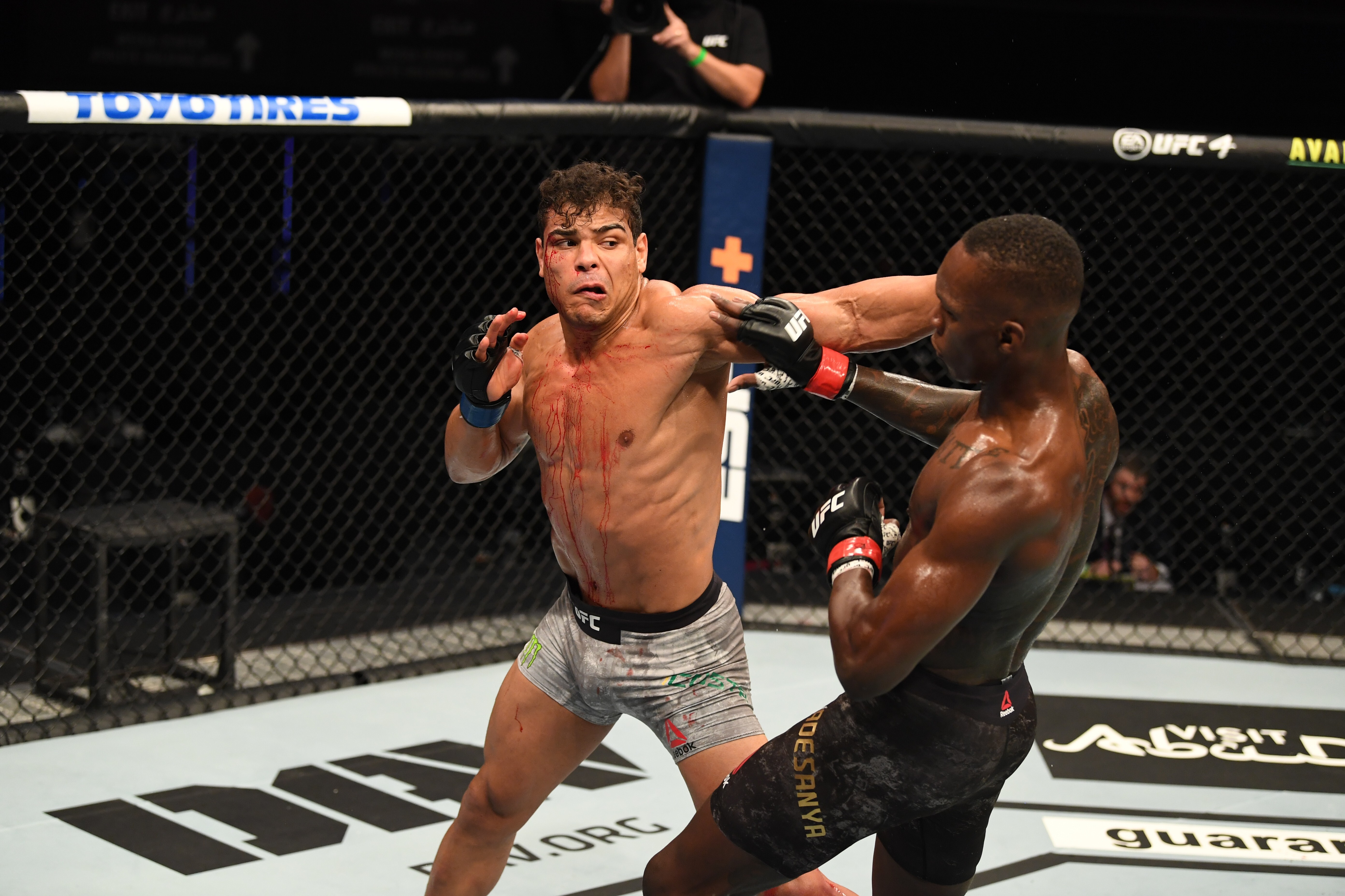 Paulo Costa punches Israel Adesanya in their middleweight championship bout during UFC 253 inside Flash Forum on UFC Fight Island on September 27, 2020 in Abu Dhabi, United Arab Emirates. Photo: Josh Hedges/Zuffa LLC