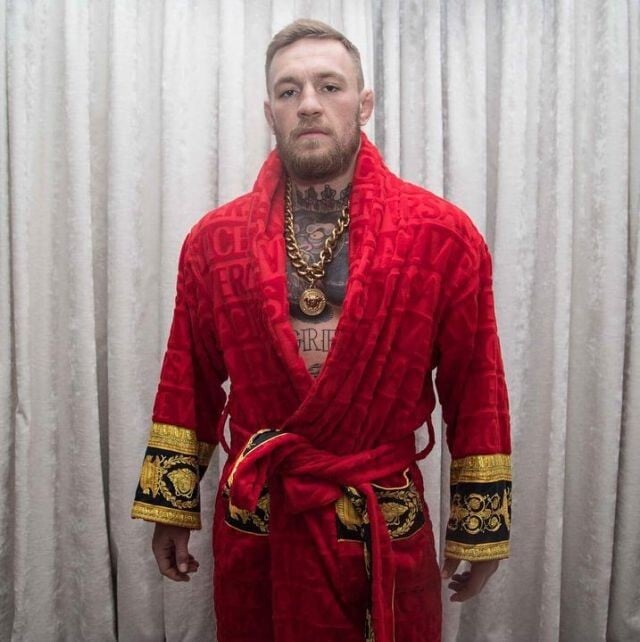 Conor McGregor in a red Versace robe, also worn by Drake, Kanye and Kevin Hart. Photo: Instagram/@thenotoriousmma