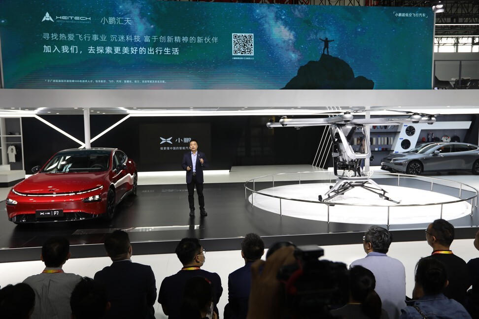 XPeng Motors’ CEO He Xiaopeng unveils its flying car Kiwigogo(right) at the 2020 Beijing International Automotive Exhibition on Saturday, Sep. 26, 2020. Photo: Simon Song