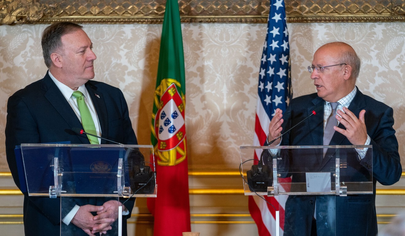 Portuguese Foreign Minister Augusto Santos Silva (right) at a press briefing with US Secretary of State Mike Pompeo in Lisbon last year. Photo: dpa