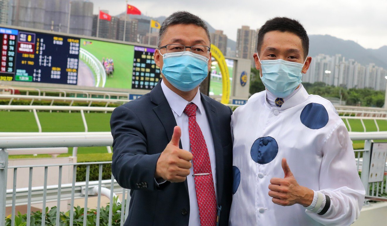 Vincent Ho with trainer Francis Lui after Golden Sixty’s victory.