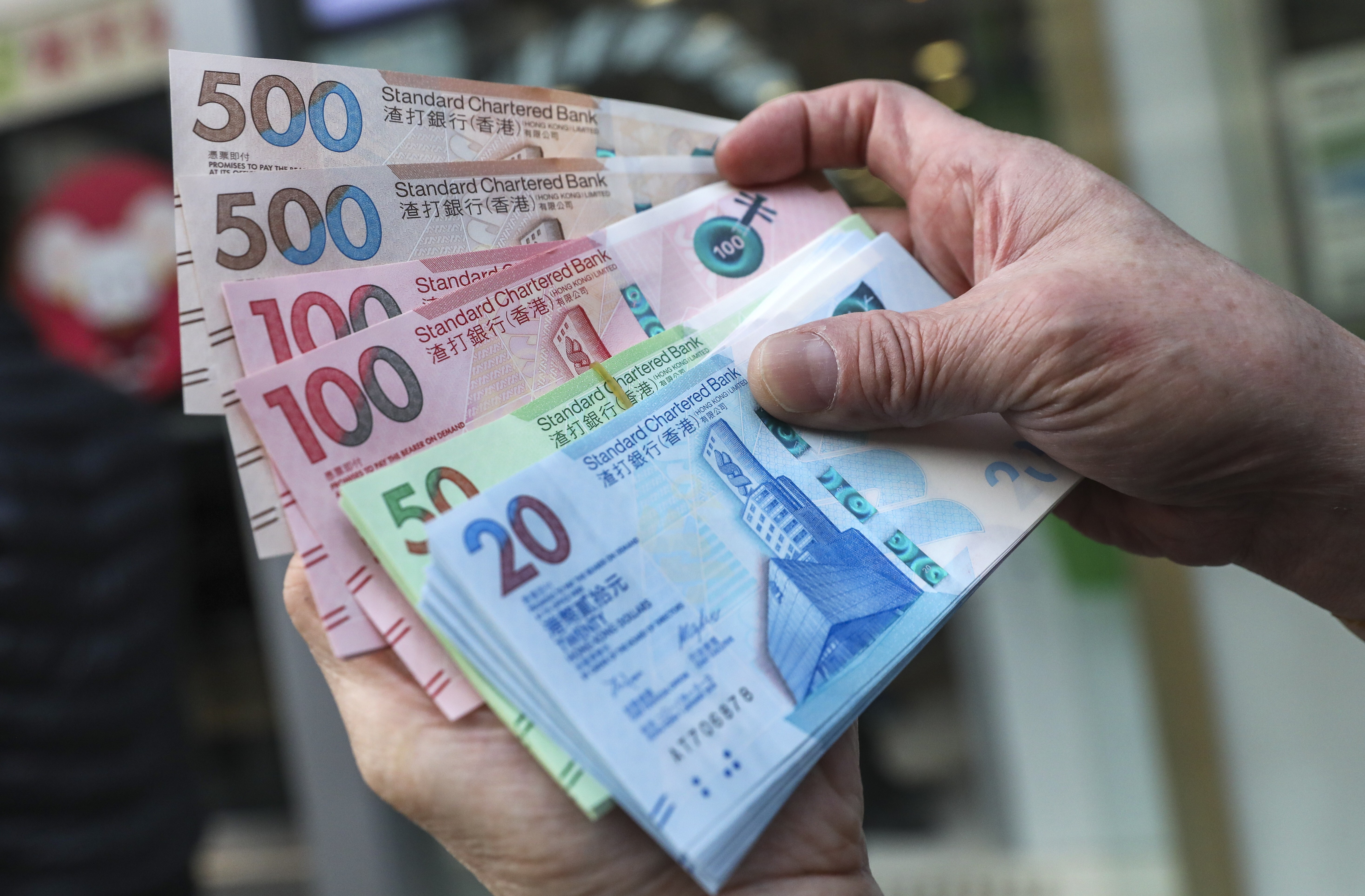 Hong Kong’s monetary authority has intervened 53 times so far this year to weaken its currency amid an inflow of hot money chasing after stock offerings. Photo: Winson Wong
