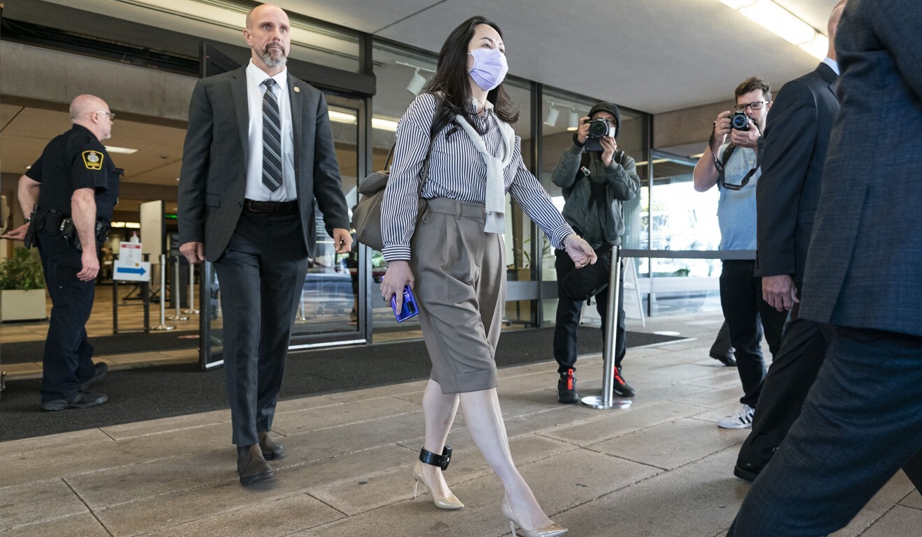 Meng leaving the BC Supreme Court in Vancouver during a break in her hearing on Monday. Photo: AFP