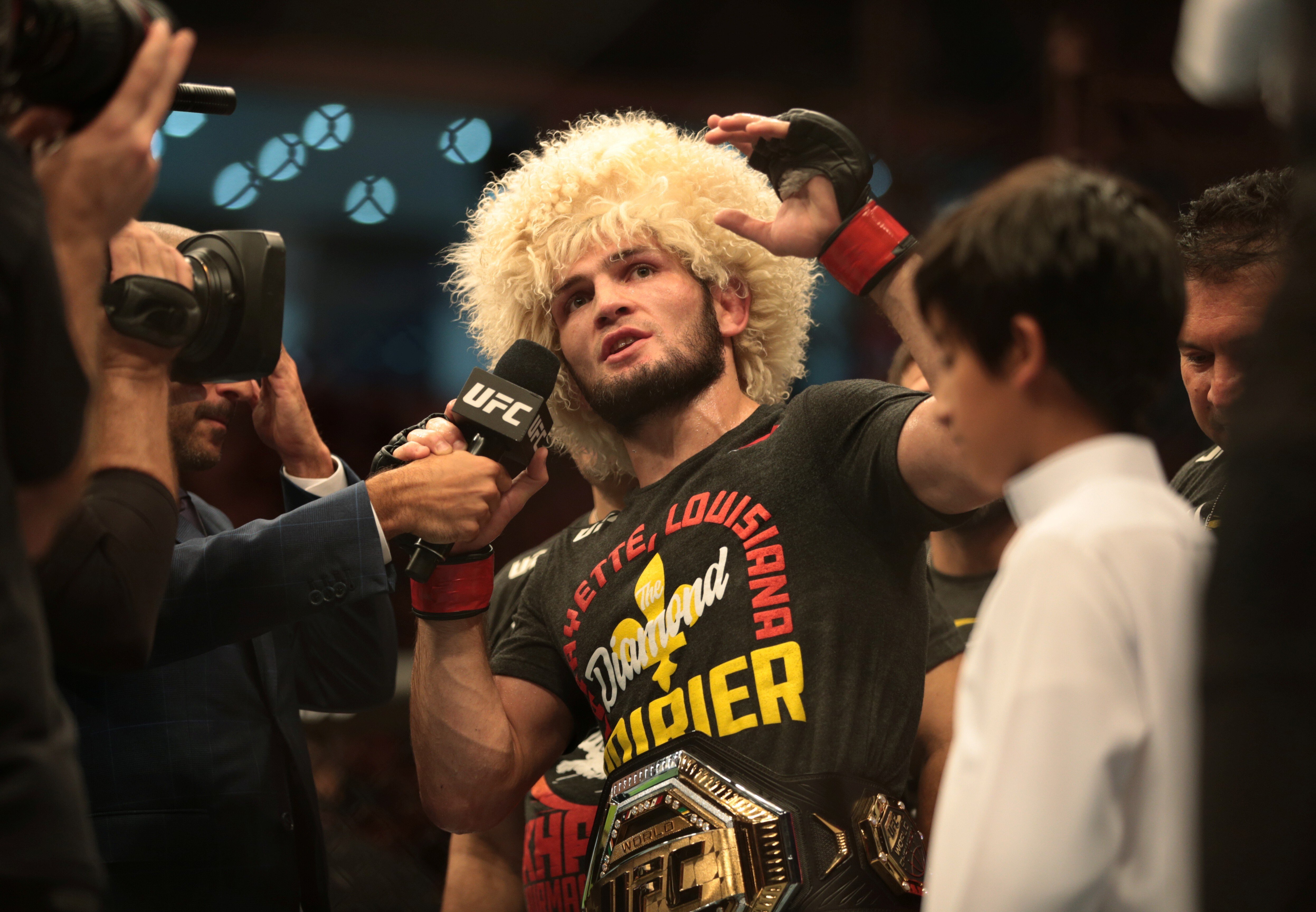 Khabib Nurmagomedov speaks to the media after beating Dustin Poirier. Photo: Reuters