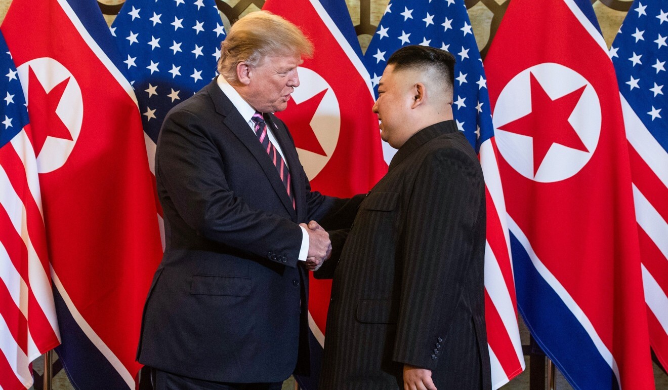 US President Donald Trump shakes hands with North Korean leader Kim Jong-un in Hanoi last year. Photo: AFP