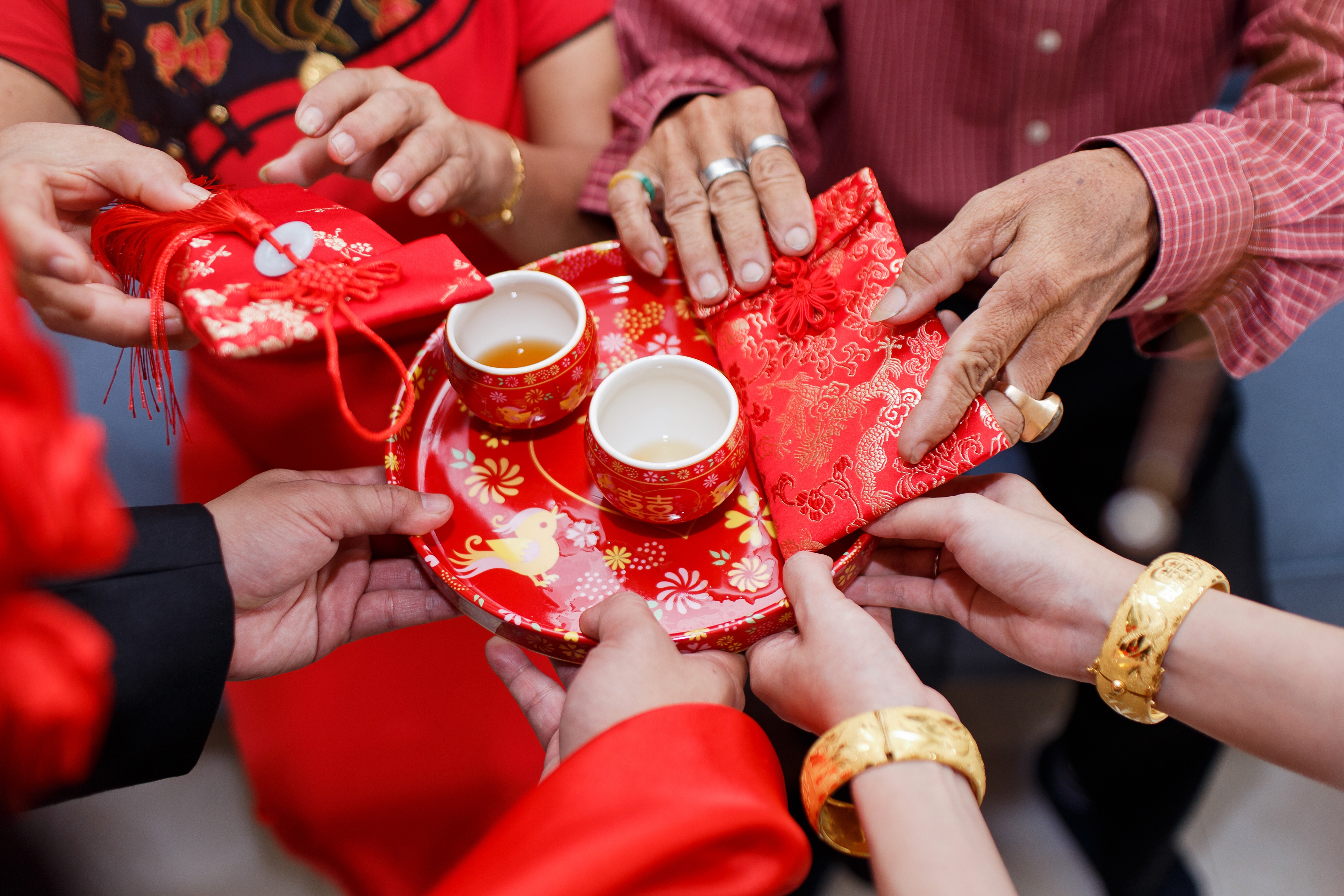A bride and groom take part in a traditional tea ceremony, a key event during Chinese weddings. The notion that a child is best raised in a family with a mother and a father is still strong in Hong Kong culture. Photo: Shutterstock