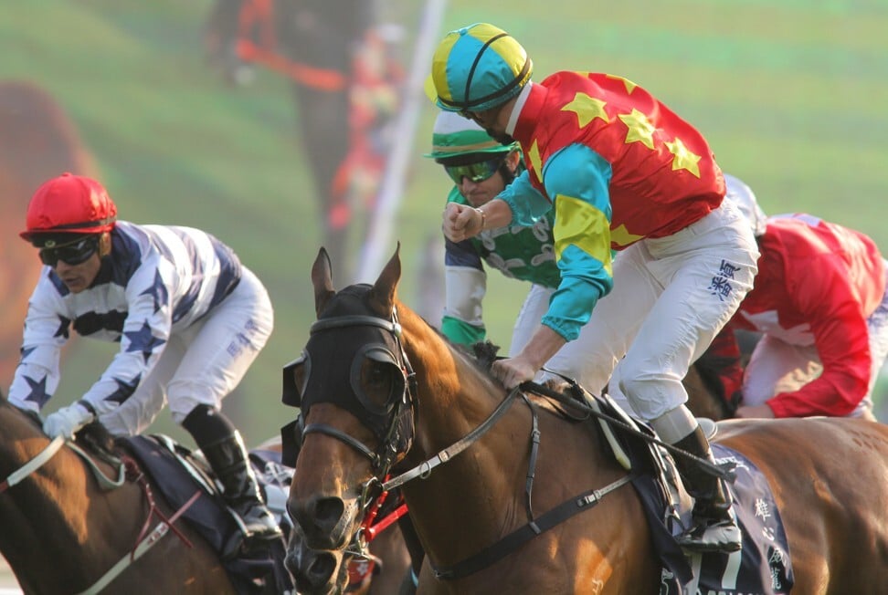 Zac Purton yells back at Douglas Whyte after winning the 2012 Hong Kong Mile on Ambitious Dragon.