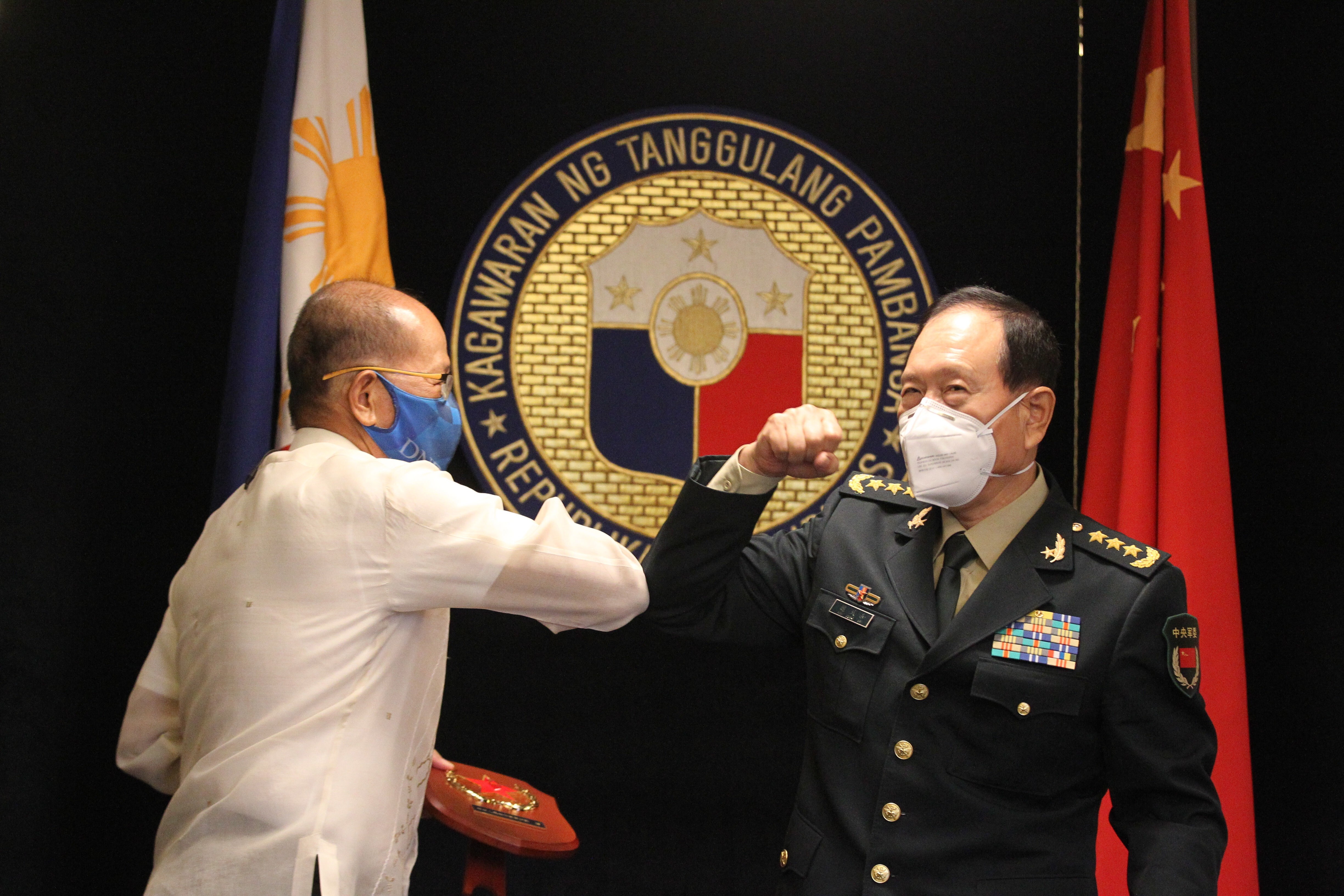As part of its Southeast Asia diplomatic blitz, Chinese Defence Minister Wei Fenghe, right, met Philippine Defence Secretary Delfin Lorenzana, in Manila in September to discuss defence and military cooperation. Photo: EPA