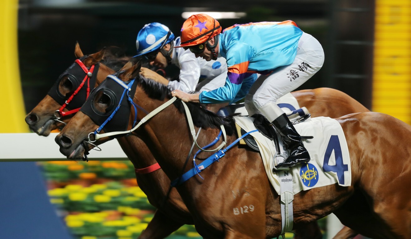 Zac Purton aboard Dances With Dragon (outside) fights out a finish with Joao Moreira and Enrichment last season.