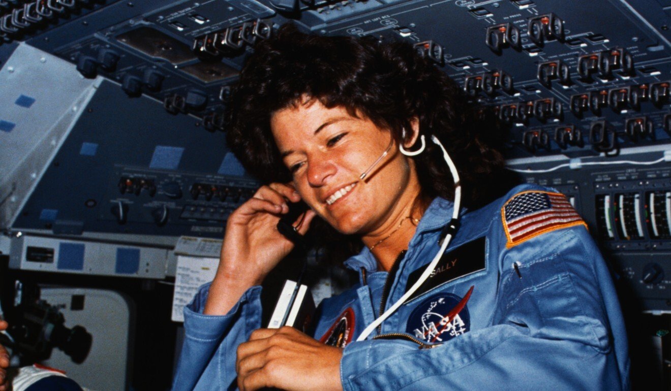Sally Ride, STS-7 mission specialist, communicates with ground controllers from the flight deck of the Space Shuttle Challenger. Photo: Bettman Archive