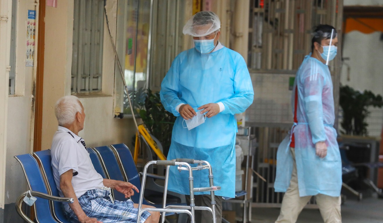 Medical workers take care of a man at Cornwall Elderly's Home Golden Branch in Tuen Mun in July. Photo: Dickson Lee