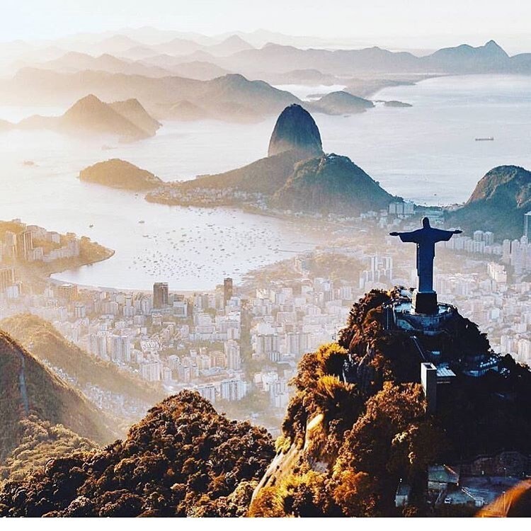 Brazil’s reopening: Can you samba and socially distance? The giant statue of Christ the Redeemer overlooks Rio from the 2,329-foot summit of Corcovado. Photo: @world__world_world
