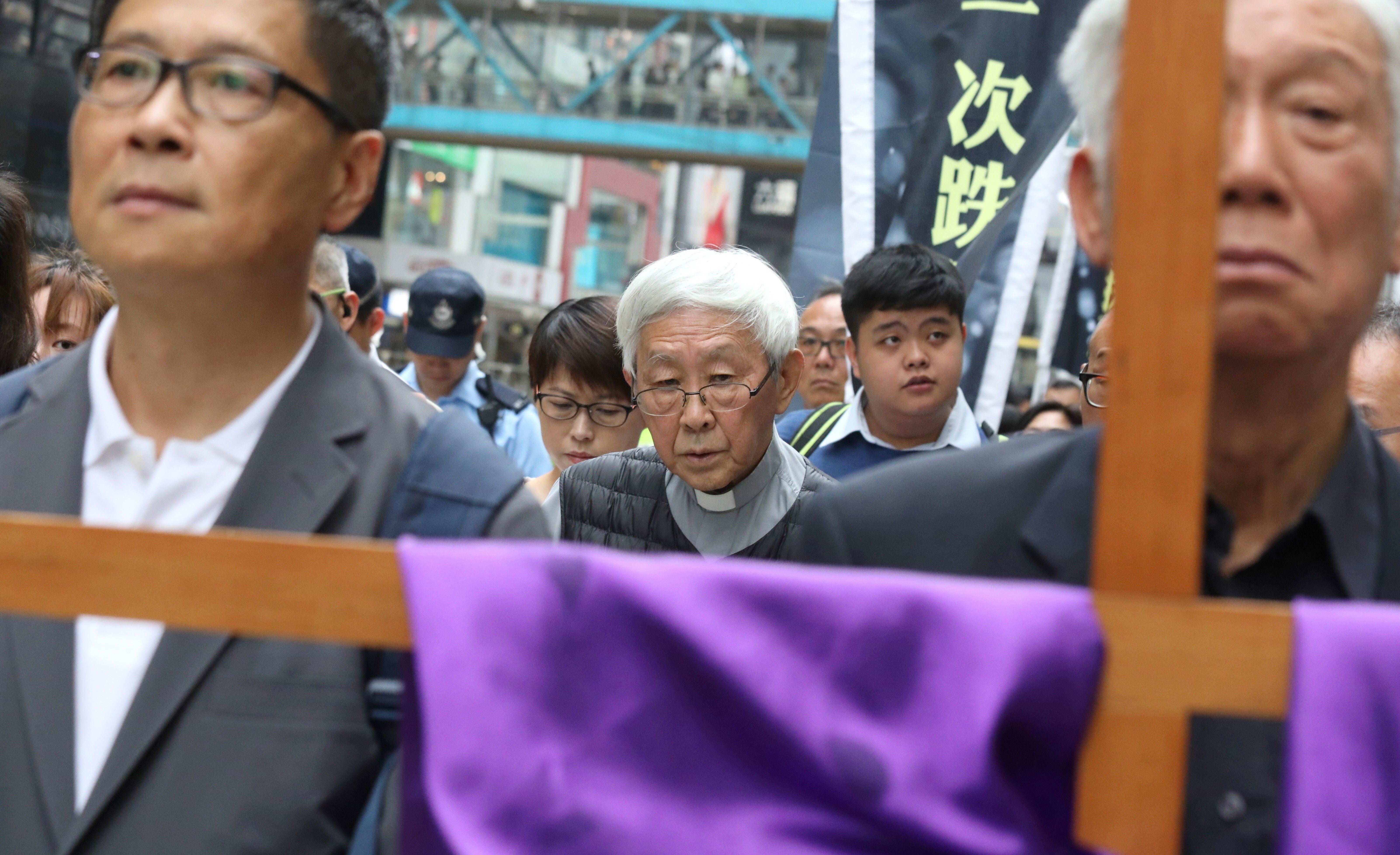 Cardinal Joseph Zen (centre) joins Christians (both Catholics and Protestants) in a protest rally from Causeway Bay to the central government headquarters in Admiralty, to mark the death of democracy in Hong Kong on March 30, 2019. Photo: Dickson Lee