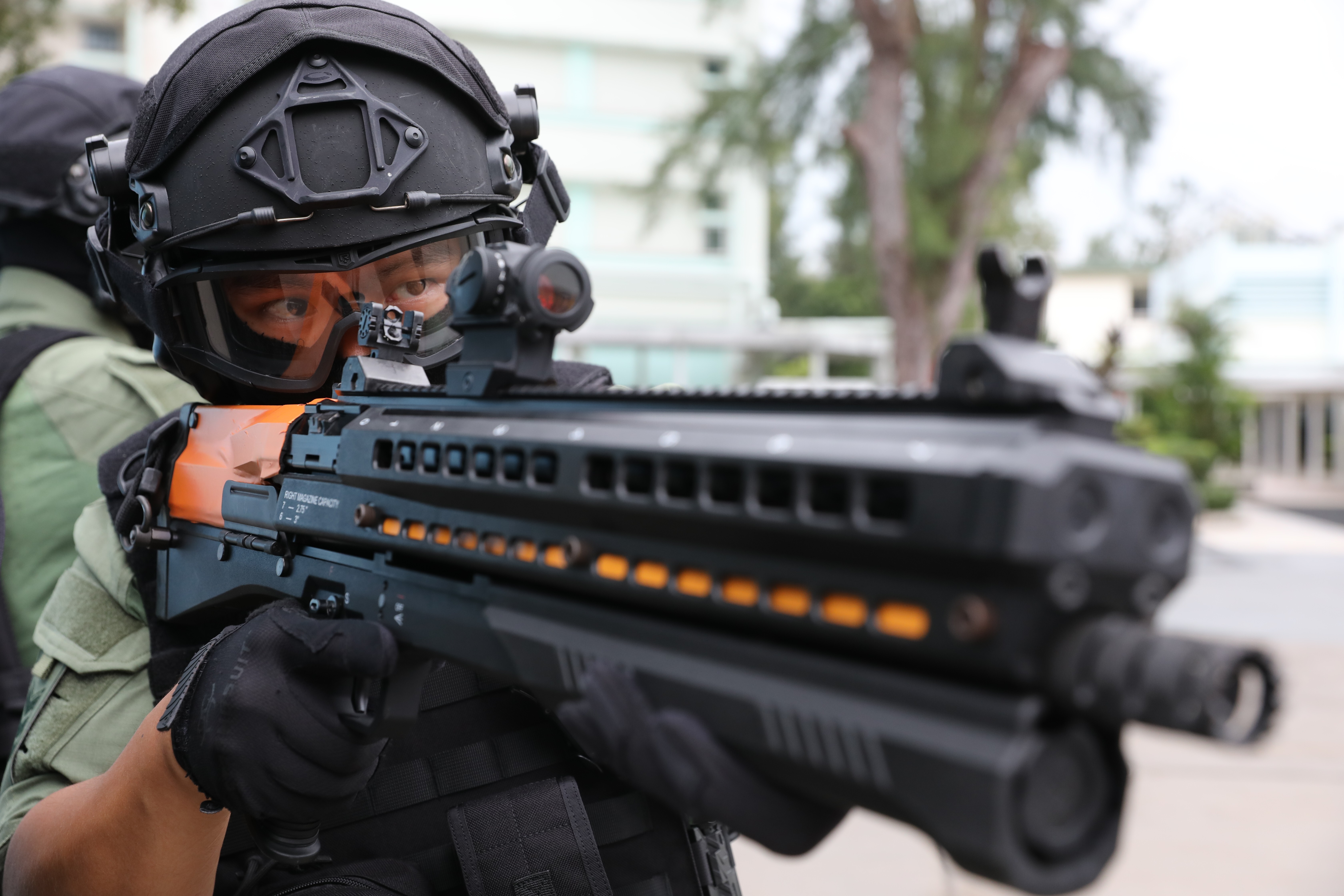 The upgraded tactical shotgun can fire beanbag rounds or rubber bullets. It has triple the loading capacity of the traditional model. Photo: Nora Tam