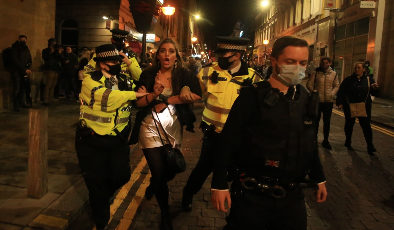 Police patrol as revellers enjoy a night out in the centre of Liverpool, north west England, on Saturday. Photo: AFP
