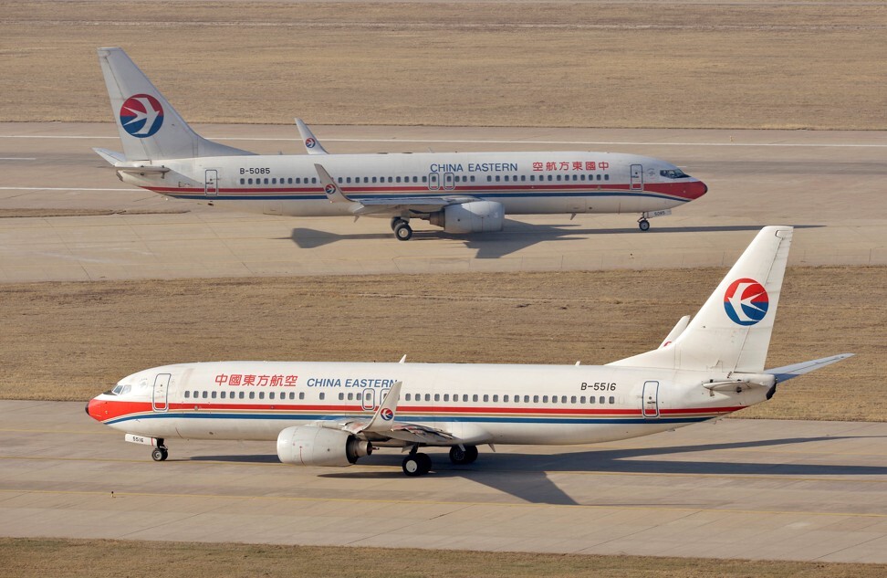 A pair of China Eastern Airlines’ Boeing 737-800 planes at an airport in Taiyuan, Shanxi province on April 6, 2014. Photo Reuters