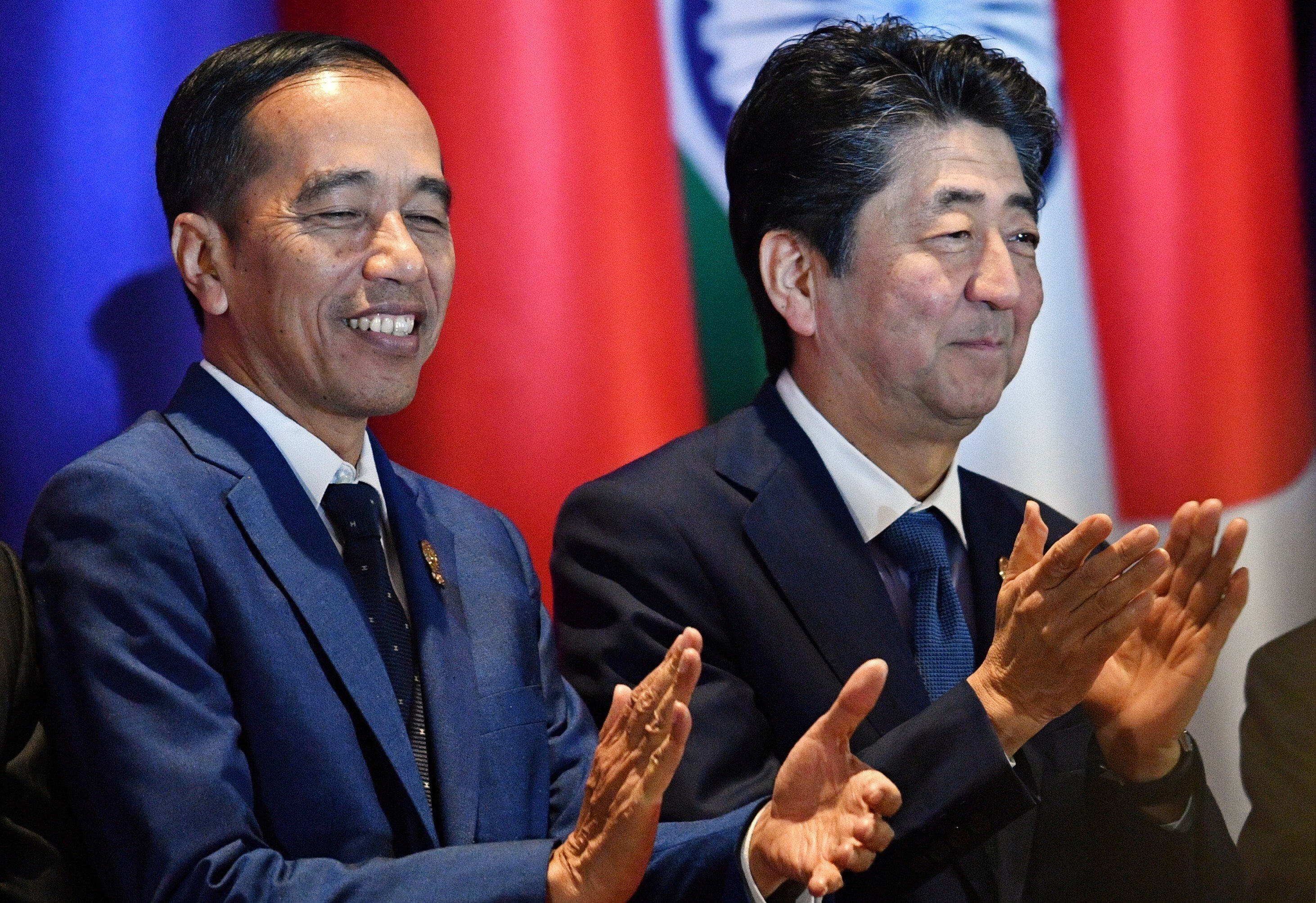 Indonesian President Joko Widodo, left, and then Japanese prime minister Shinzo Abe attend the East Asia Summit in Bangkok on November 4, 2019. Japan has long-standing ties with Southeast Asia, and those ties are likely to continue growing with the region’s centrality in the notion of the Indo-Pacific. Photo: Reuters