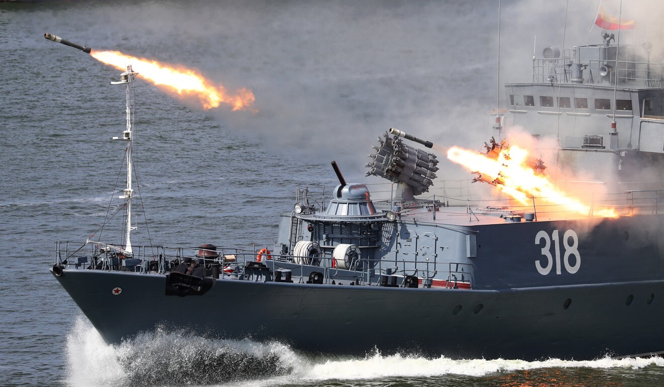 Russian anti-submarine ship Aleksin fires missiles during the Navy Day parade in Baltiysk in July. Photo: 2020