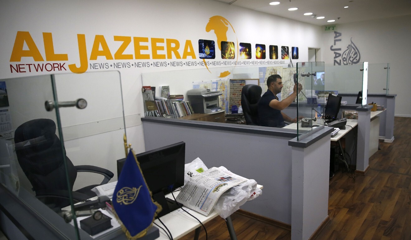 An employee of news network and television channel Al Jazeera is pictured at the channel’s Jerusalem office in 2017. Photo: AFP