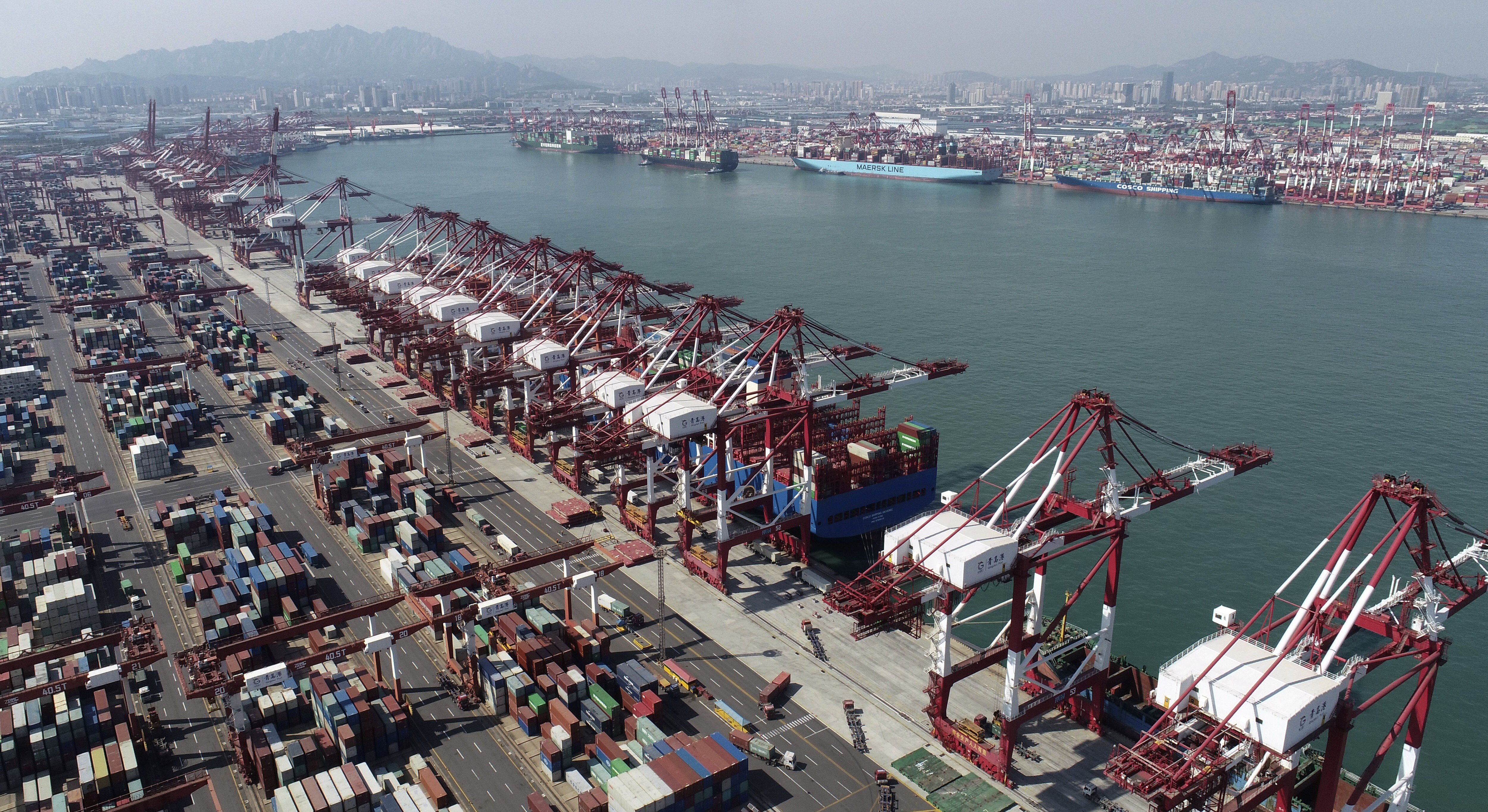 Container ships are docked at a container port in Qingdao in eastern Shandong province on October 8. China’s economy has experienced a rebound in recent months, but its recovery is unlikely to boost the global economy given the recent trend towards deglobalisation. Photo: AP