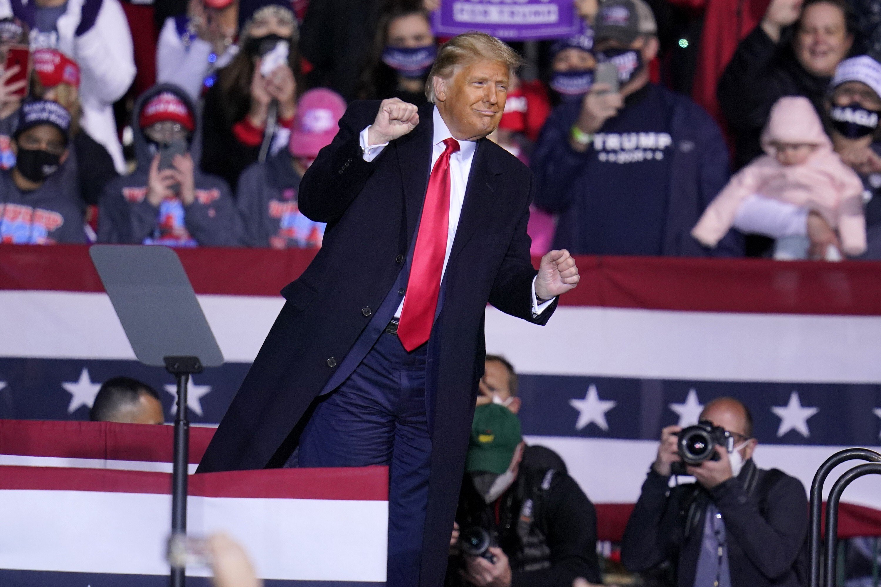 President Donald Trump dances to the song YMCA as he finishes a campaign rally in Johnstown, Pennsylvania. Photo: AP