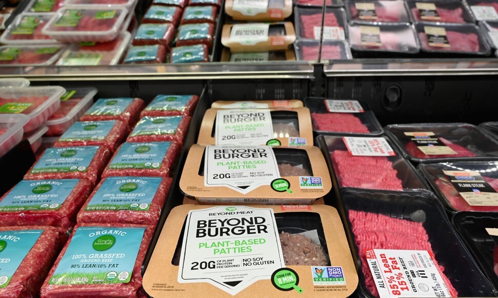 Beyond Meat’s Beyond Burger patties, made from plant-based substitutes for meat products, sit alongside various packages of ground beef for sale in New York. Photo: AFP