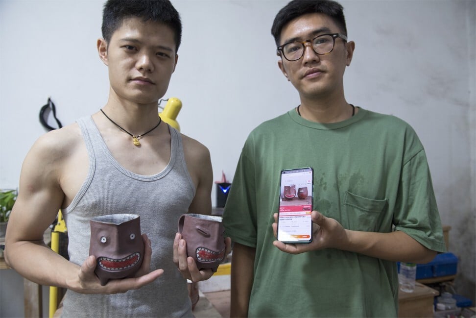 Cheng Peng (right) sells products by dozens of designers, including Tart Bro (left). Photo: Zigor Aldama