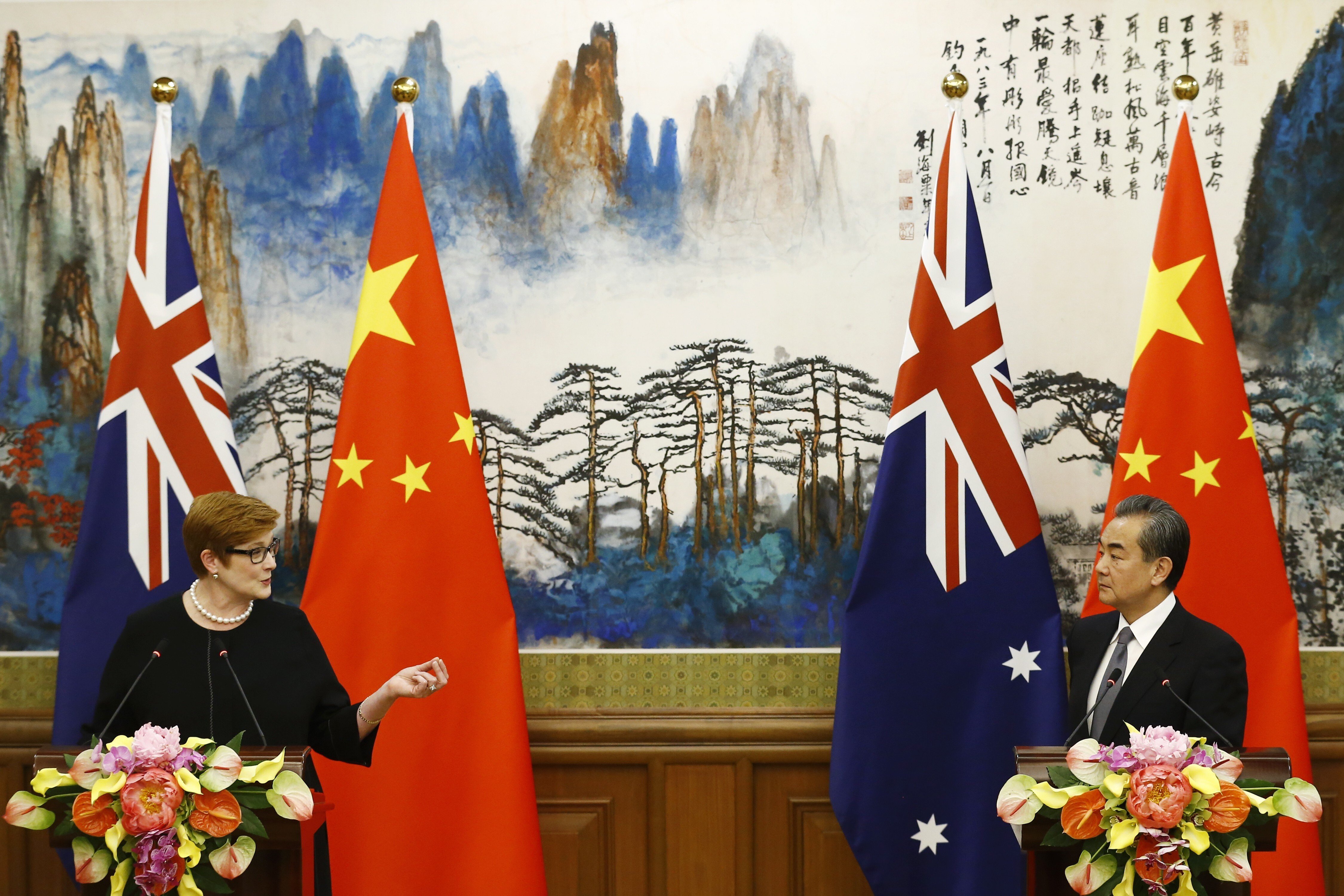 Australian Foreign Minister Marise Payne and Chinese Foreign Minister Wang Yi are seen after a meeting in Beijing in 2018. Photo: EPA-EFE