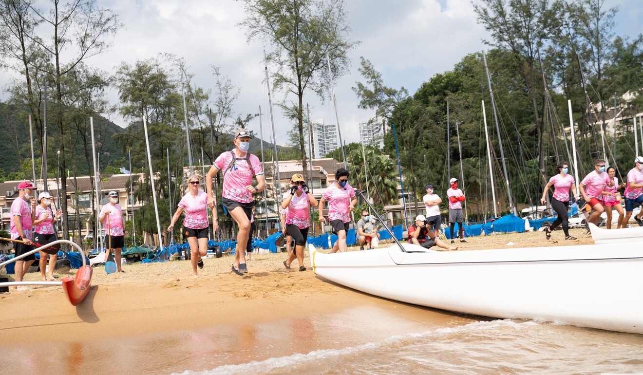 The rowers in Discovery Bay go out into the water but stay close to shore to remain visible.