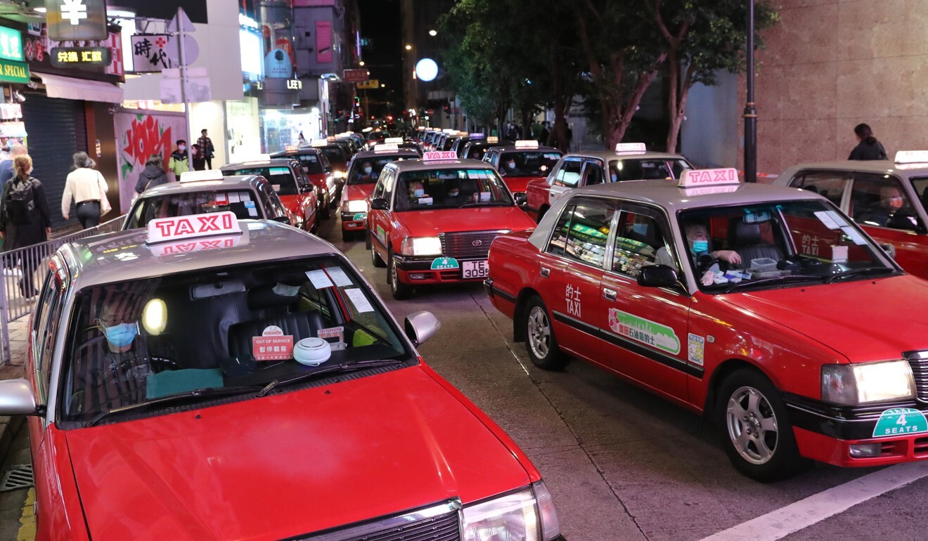 Taxi drivers waiting for passengers in Causeway Bay. The average number of Hong Kong taxi passengers a day dropped to 620,500 in July this year, when the city was in its third wave of Covid-19 infections, from about 859,600 in the same month in 2019. Photo: Edmond So