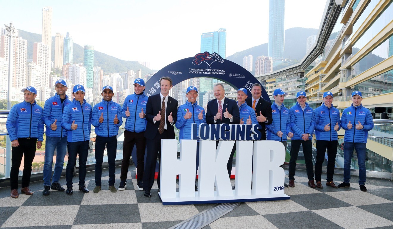 Jockey Club officials pose for photos with the riders competing in the 2019 International Jockeys’ Championship.