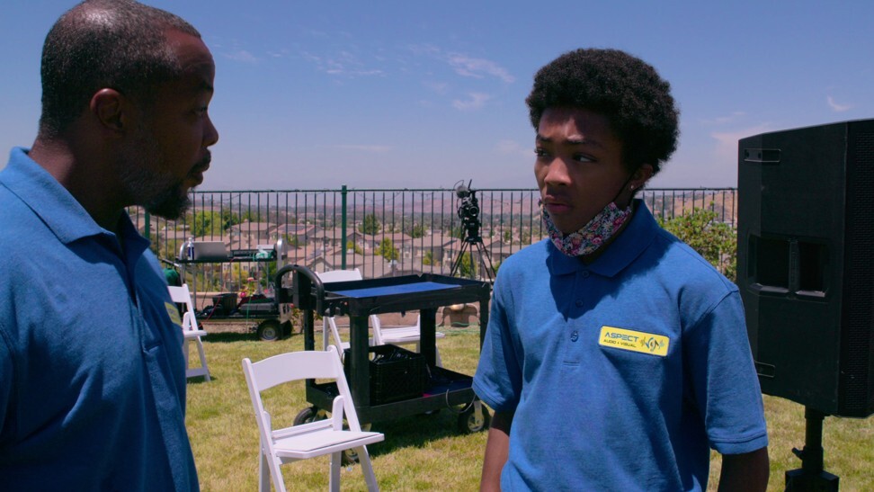 Asante Blackk’s character, Corey, finds himself at odds with his boss, played by his real-life dad, Ayize Ma’at (left), over an anti-police- brutality protest. Photo: Netflix