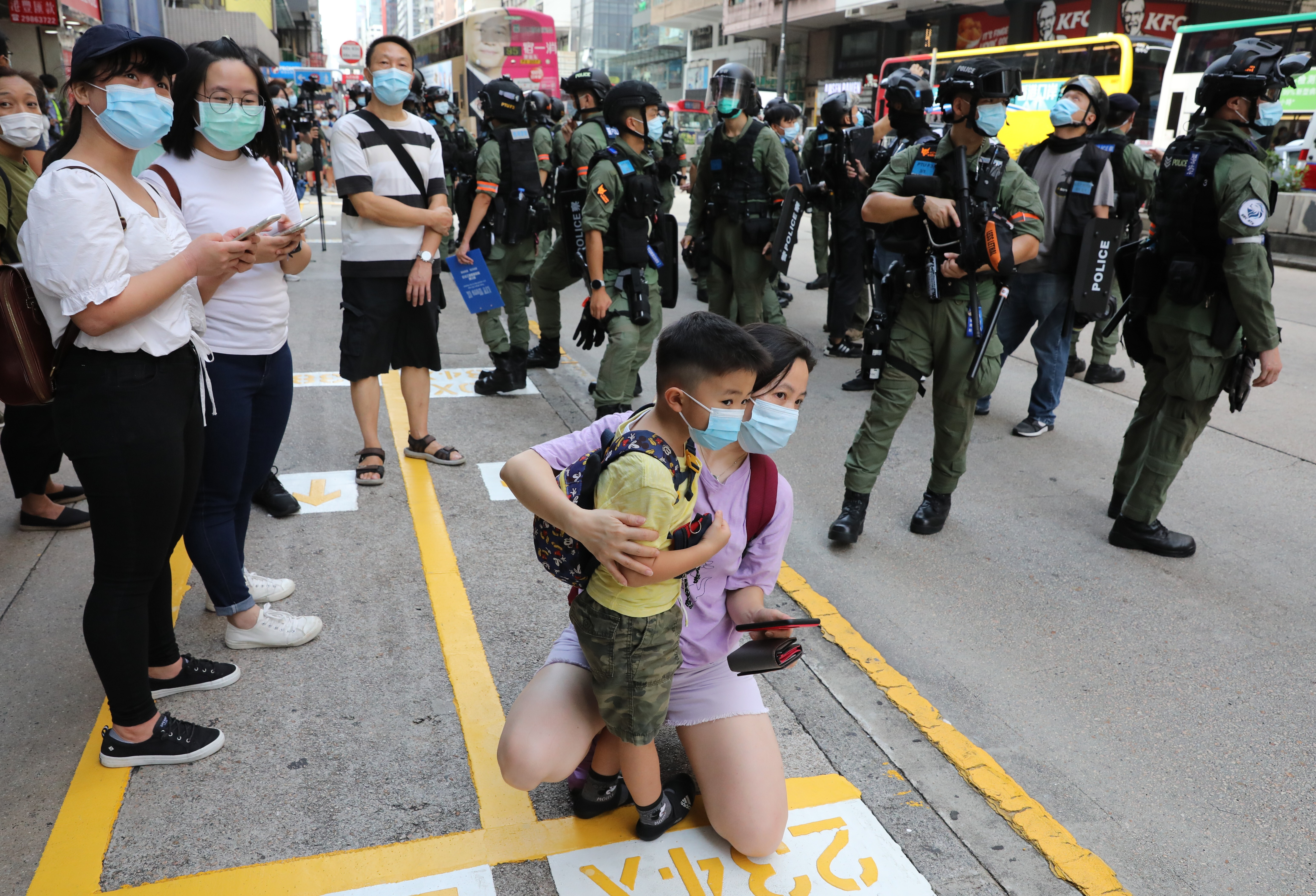 Hong Kong police officers stand guard in Mong Kok in response to calls on social media to stage anti-government protests and rally from Jordan to Mong Kok on what would have been the day of the Legislation Council election, on September 6. Photo: May Tse