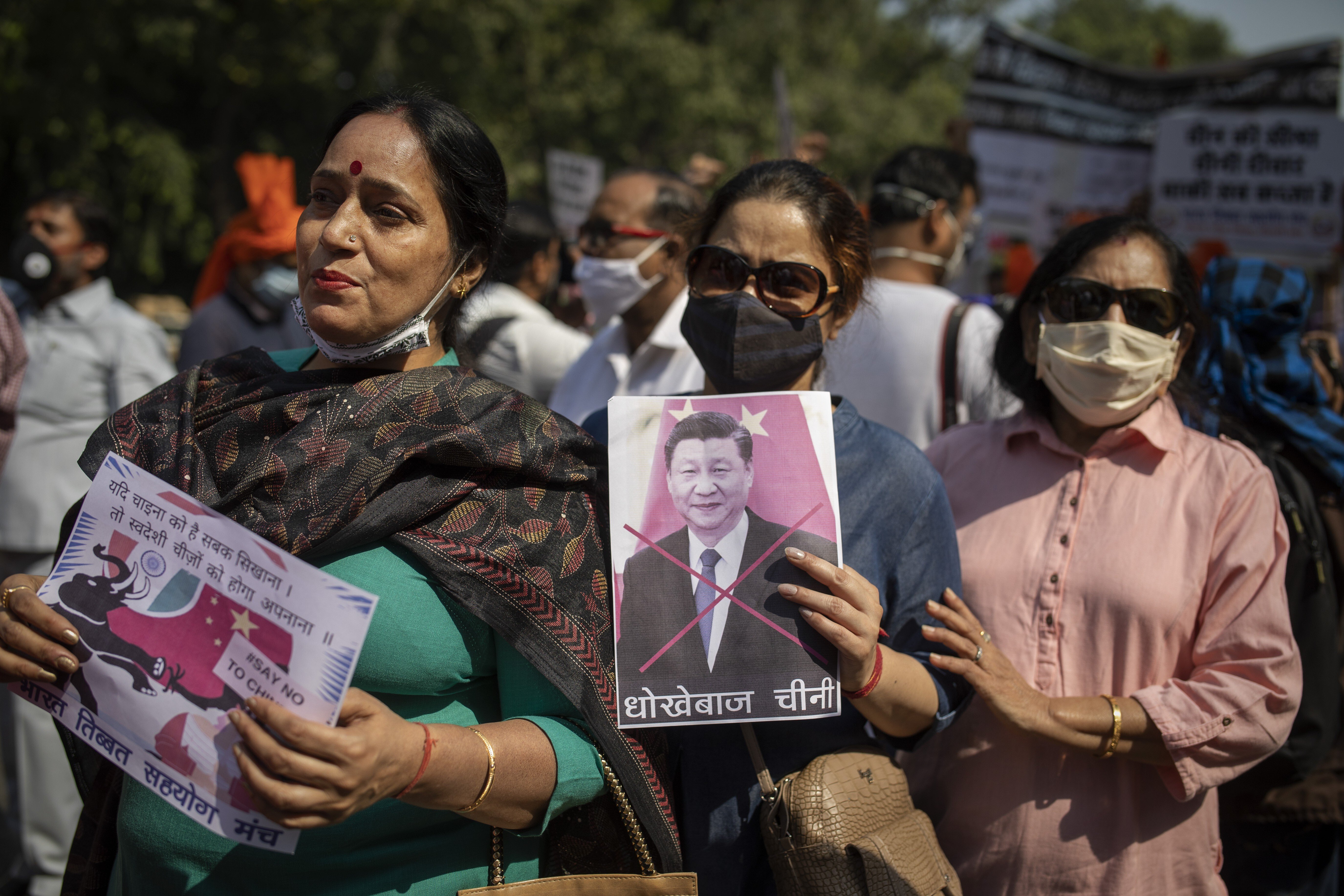 Indians, under the banner of Bharat Tibet Sahyog Manch, gather for a protest near the Chinese embassy in New Delhi on October 20. India’s leaders face a difficult balancing act between their desire for cooperation and trade with Beijing, and the public’s increasingly negative view of China. Photo: AP